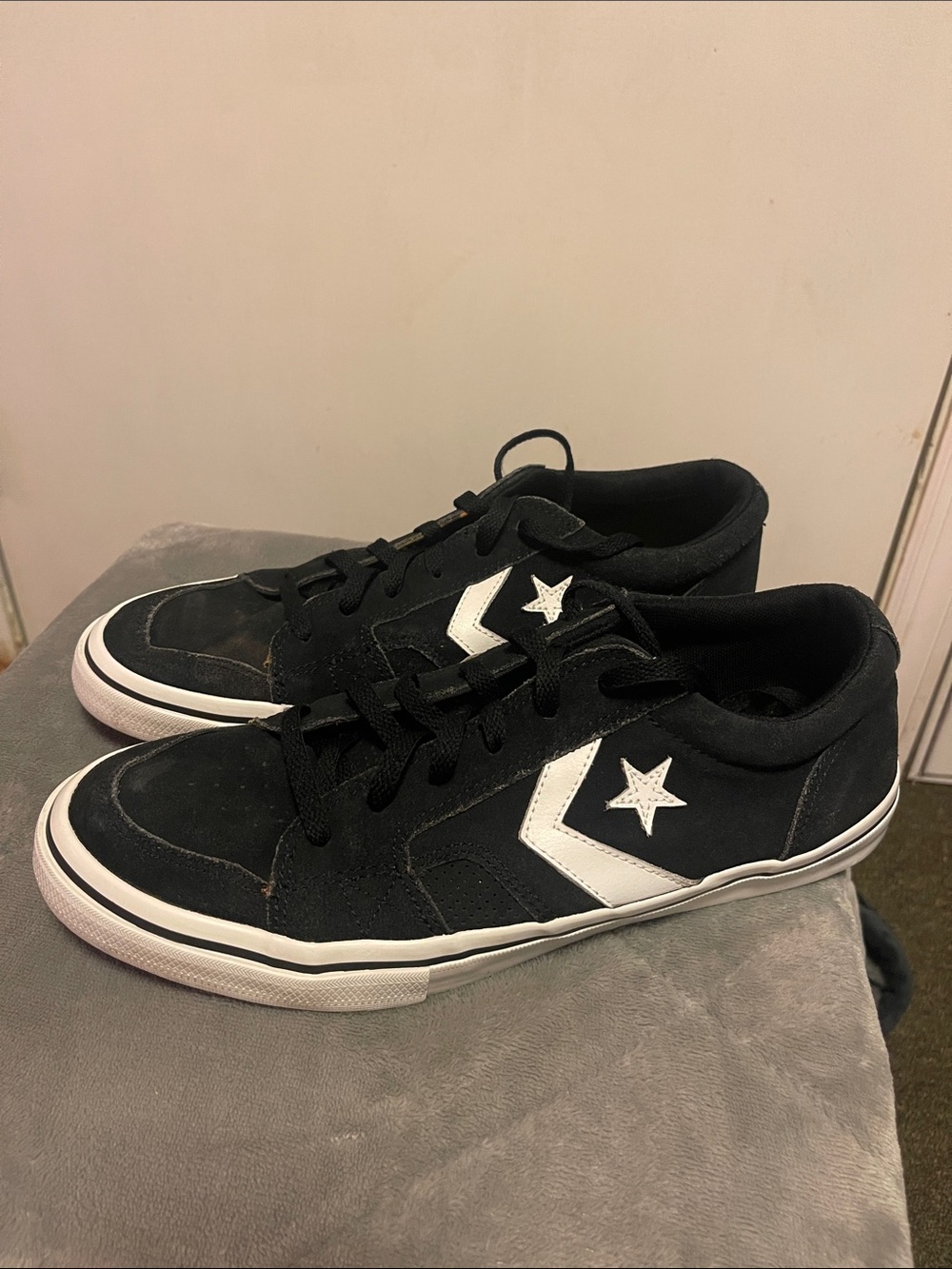 Converse “Cons” Black Low-Top Sneakers with White Star Chevron Accent
